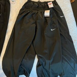 Men’s Nike parachute joggers two pair new with tags